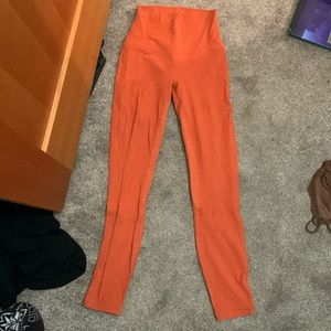 Orange lululemon leggings size 2 never worn